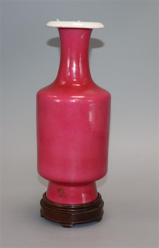 A Chinese ruby glazed vase, Juren tang mark, Republic period, H. 22.5cm, wood stand